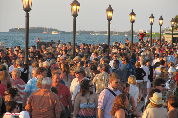 People watching the sunset at Mallory Square on coastal drives with the best sunset views